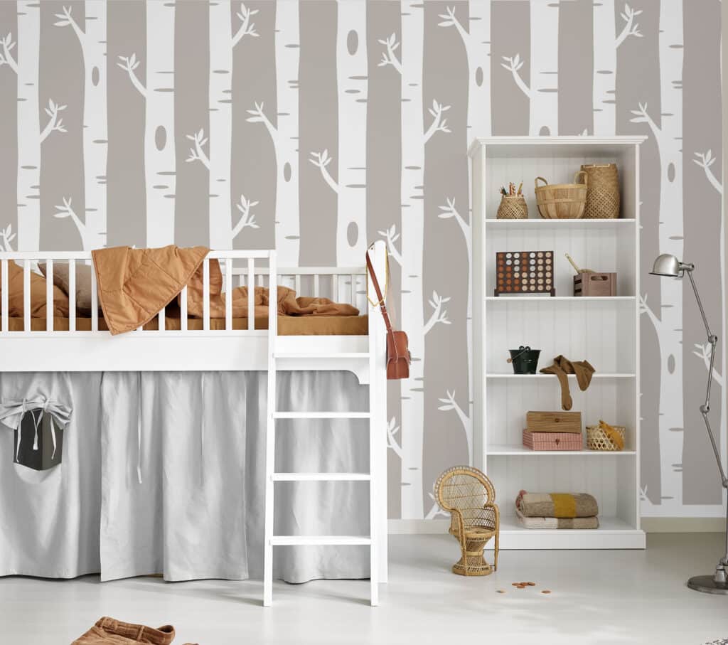 Kids bedroom with birch tree khaki wallpaper, white bunk bed, and cozy decor.