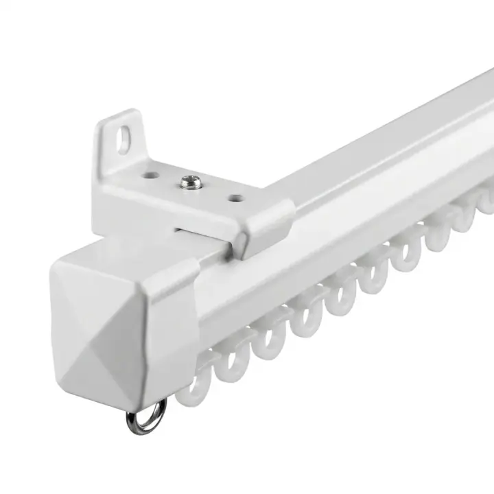 White aluminium curtain track with racer gliders for smooth curtain movement.