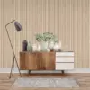 Modern wooden sideboard with decorative vases and plants in front of oak wall paneling.