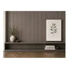 Modern grey and black wall panel with decorative plant and framed artwork.