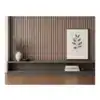 Walnut black wall panel with decorative shelf and framed botanical art.